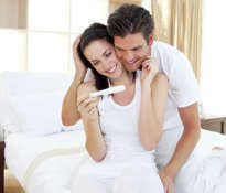 Enamoured couple finding out results of a pregnancy test